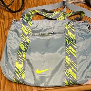 Used Nike Bag - medium size/overnight bag gray & florecent yellow